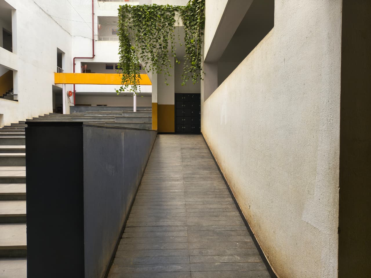 Wheelchair-accessible ramp with handrails