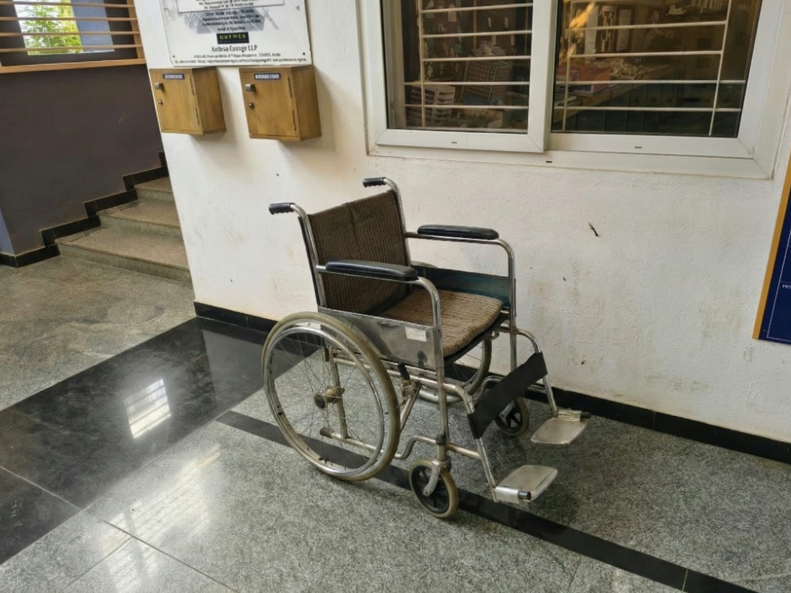 Wheelchair-accessible ramp with handrails